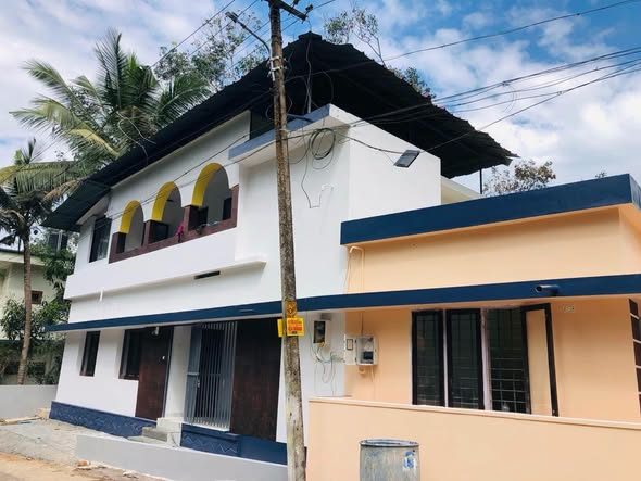 4 cents plot with 1400 sqft house for sale in Kolanchery - 150 meters from the highway 43 lakhs.